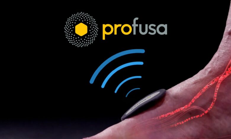 A close-up image of a wearable biosensor device on a person's hand with red-highlighted blood vessels, showing wireless signal waves and the Profusa logo above, representing biomedical monitoring technology.